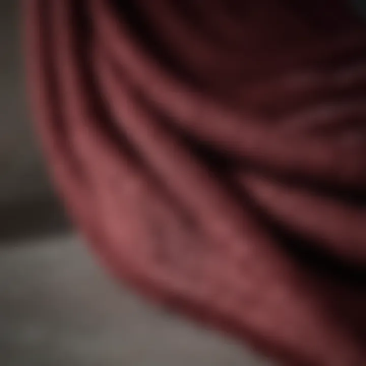 Close-up of burgundy towel fabric showcasing texture and quality