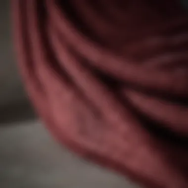 Luxurious Fabric Details Close-up of burgundy towel fabric showcasing texture and quality