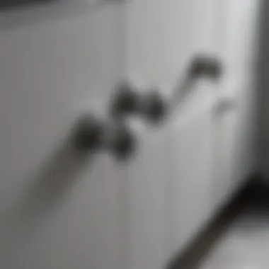 Close-up of chrome cabinet handles on a stylish bathroom vanity