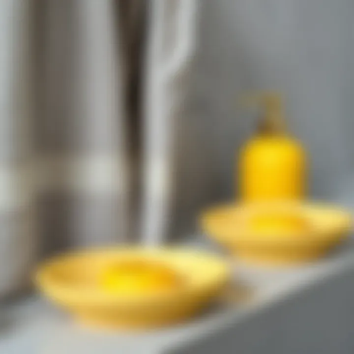 Textured Towels and Vibrant Soap Dishes Close-up of textured gray towels next to vibrant yellow soap dishes