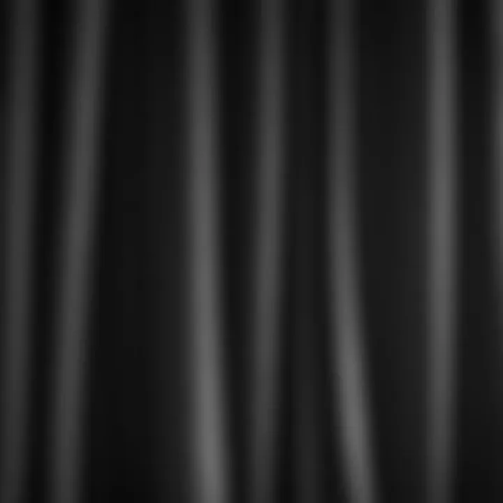 Close-up of the fabric texture of dark grey curtains