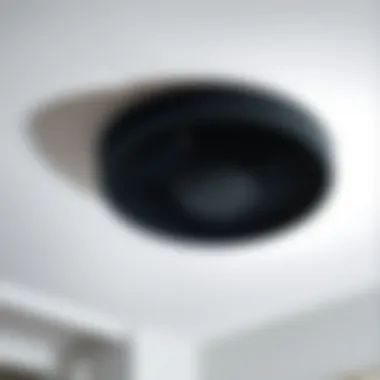 Effortless Installation Showcase Installation of a matte black bathroom exhaust fan with light