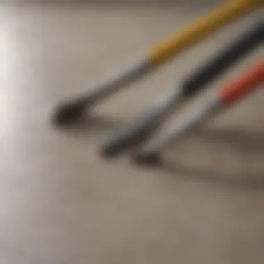 A close-up of tile installation tools laid out on a surface